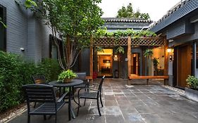 Qiuguo Hutong Courtyard Hotel